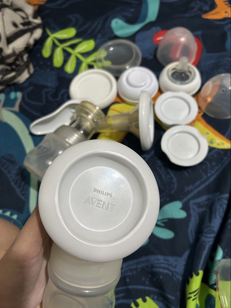 Philips Avent Manual Breast Pump Set with Bottles (Category: Breastfeeding & Bottle Feeding) located in Mandaluyong City. Submitted by aaye.44 (Listing ID 1467945018, Image 2). Description: - Authentic Philips Avent manual breast pump bundle - Includes 2 bottles, pump handles, sealing discs - Durable plastic design - Fully disassembled - Compact and convenient setup for expressing milk while traveling Selling as is where is, what you see is what 