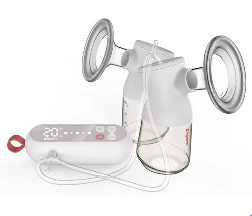 Pigeon Electric Breast Pump Double Set (Category: Breastfeeding & Bottle Feeding) located in Quezon City. Submitted by thrifteesph930 (Listing ID 1467846121, Image 1). Description: - Brand: Pigeon - Type: Double electric breast pump - Digital control unit with battery indicator and 20-minute timer - Easy-to-use touch panel for customizable suction levels - Compact white motor unit with a handy red fabric hanging loop - Includes dual tubing system