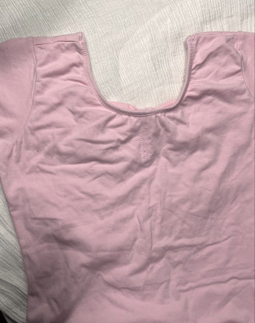 Pink Ballet Skirted Leotard with Back Bow (Category: Babies & Kids Fashion) located in General Mariano Alvarez. Submitted by kascade (Listing ID 1468052139, Image 3). Description: - Color: Pink - Style: Short-sleeve ballet leotard with attached chiffon skirt - Neckline: Scoop front and back - Feature: Cute bow detail on the upper back strap - Material: Soft and stretchy fabric - Ideal for: Dance class or recitals.