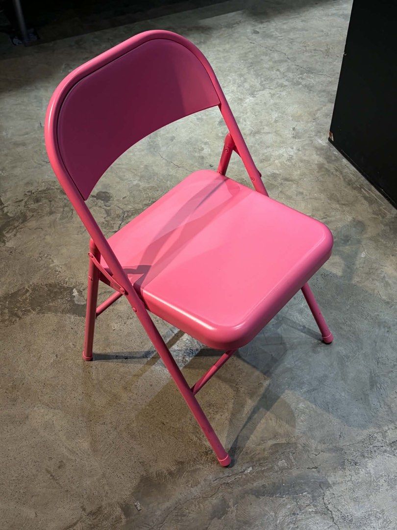 Pink Metal Folding Chair (Category: Chairs) located in Manila. Submitted by gladysshanee (Listing ID 1467941184, Image 2). Description: - Color: Bright pink - Material: Sturdy steel frame with smooth seat and backrest - Design: Folds completely flat for easy storage in tight spaces - Condition: Clean with no major dents or scratches - Perfect for: Extra seating in rooms, balconies, or gatherings.
