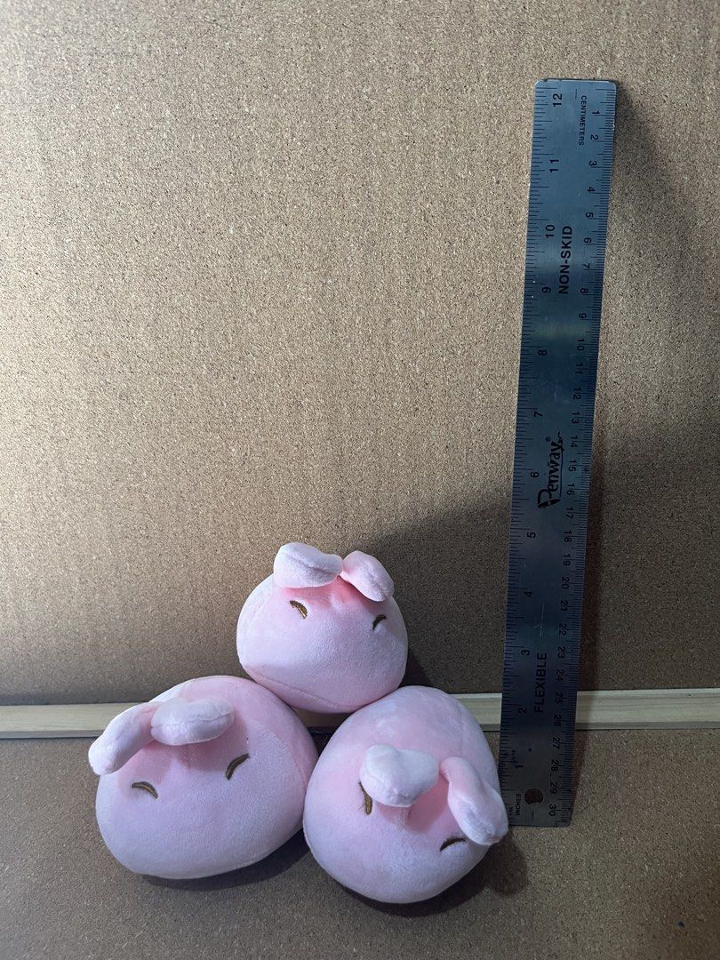 Rabbit Pink Plush Toy (Category: Plushies & Soft Toys) located in Baguio. Submitted by gaara1234 (Listing ID 1467857642, Image 1). Description: - Set of 3 adorable pink slime plushies - Features cute bunny ears and embroidered eyes - Super soft fabric material all over - Compact size: approx. 3 inches tall (see ruler for reference) - Great for desk decorations or small collectibles - Clean and well-kept condition.