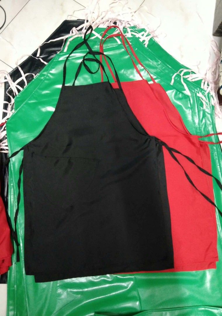 Plain aprons with front pockets in various colors (Category: Skirts) located in Manila. Submitted by jairus_clothing11 (Listing ID 1468013249, Image 3). Description: - Premium solid color apron designed for everyday kitchen, baking, crafting, or café use - Features an adjustable neck strap and secure waist ties for a comfortable fit - Convenient large front pocket to easily hold tools, phones, or recipe cards - Made from durable, easy-to-wash fab