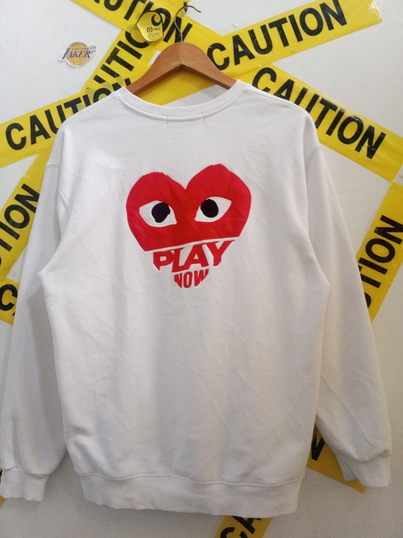 Play Comme Des Garcons Play Now White Sweatshirt (Category: Coats, Jackets and Outerwear) located in Santa Rosa. Submitted by thethriftersshop (Listing ID 1467866722, Image 2). Description: White crewneck sweatshirt Width 21.5|Length 28 Medium to Large Need Wash.
