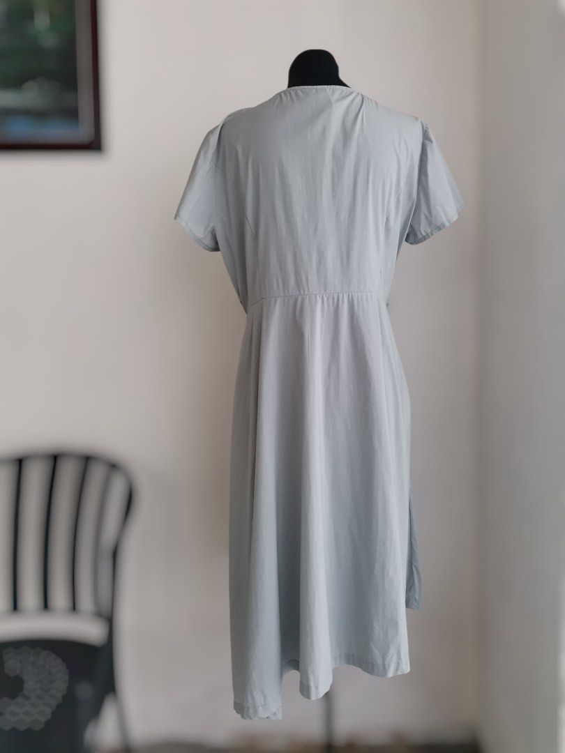 Pleated Snap-front Midi Dress (Large-XL) (Category: Dresses) located in Quezon City. Submitted by engeleaize (Listing ID 1467867792, Image 2). Description: Details: Color: Muted/Mineral Gray Style: A-line style dress, Asymmetric wrap bodice, V-neckline, snap-front buttons, structured waist pleats, belt loops Fabric: Cotton-nylon-spandex Best worn: Smart casual, workplace, sightseeing Bust: 38-40 inches Waist: 34 inches Length: 45 inches Best fit: