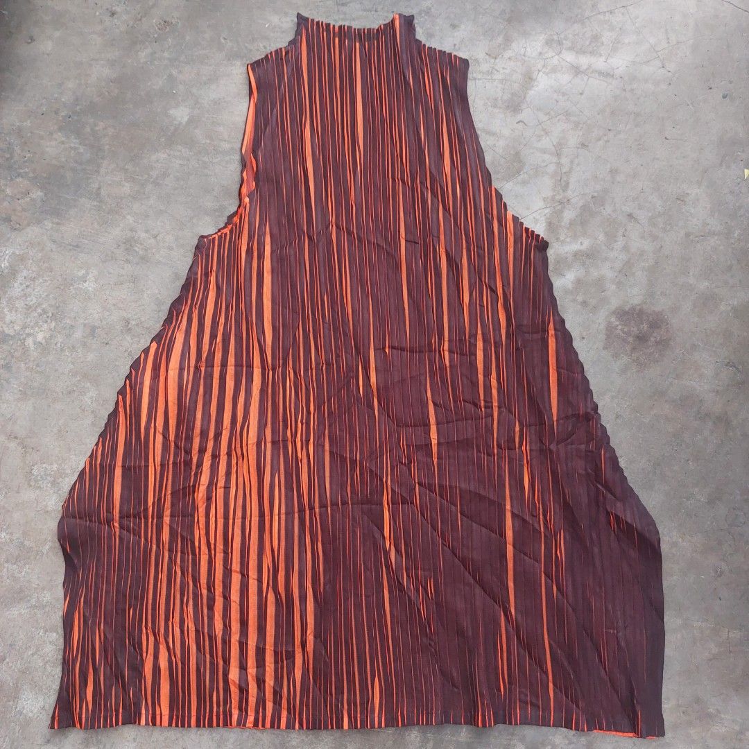 PLEATS PLEASE HIGH NECK SLEEVELESS TOPS (Category: Dresses) located in Tuguegarao City. Submitted by 3500.finds (Listing ID 1467907024, Image 1). Description: Size 3 Excellent condition Color rate 9.5/10 or better No issue.