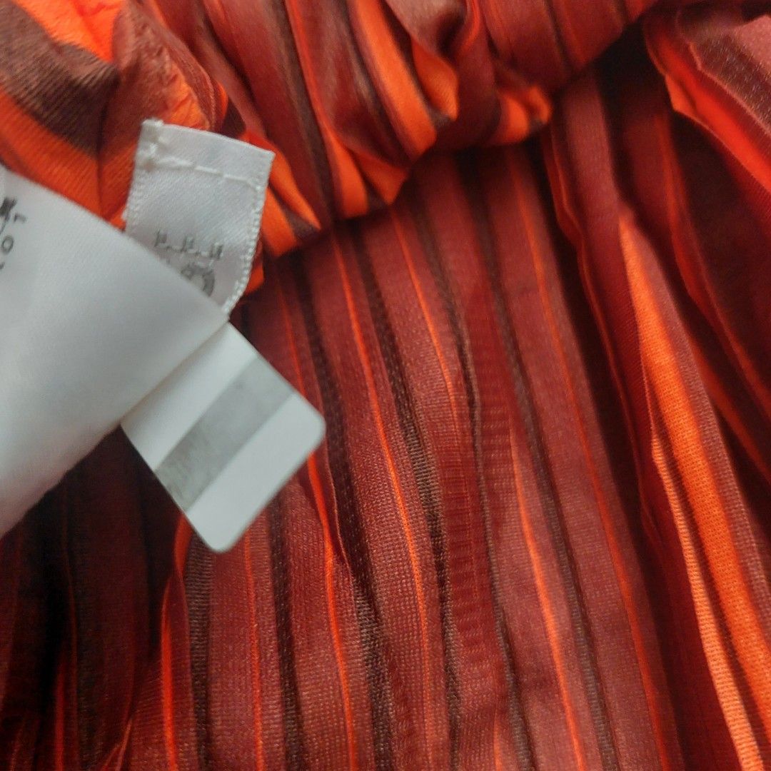PLEATS PLEASE HIGH NECK SLEEVELESS TOPS (Category: Dresses) located in Tuguegarao City. Submitted by 3500.finds (Listing ID 1467907024, Image 3). Description: Size 3 Excellent condition Color rate 9.5/10 or better No issue.