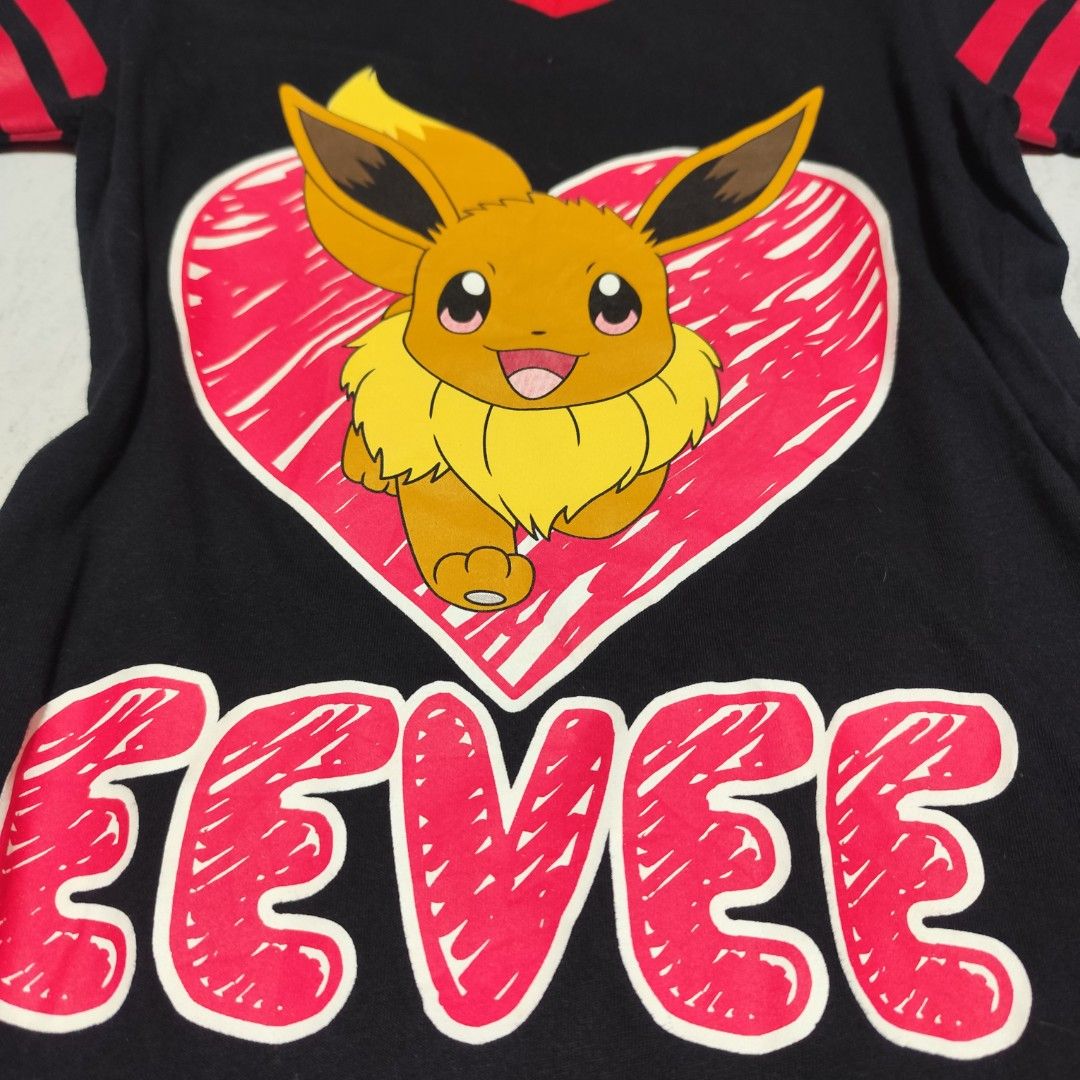 Pokemon Eevee Vneck Juniors Tee Large (Category: Blouses) located in Manila. Submitted by buyybustt (Listing ID 1467952263, Image 2). Description: 28x14 10/10 Conditon Dm.