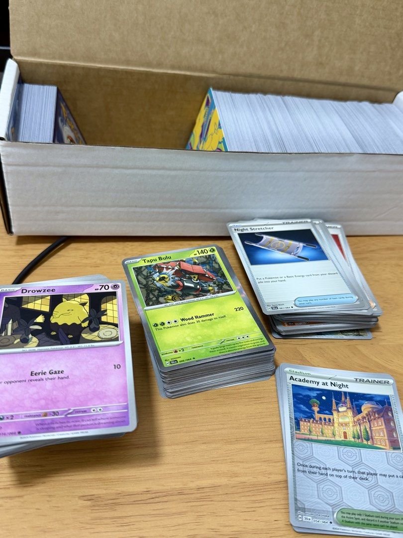 POKEMON TCG: Bulk lot (SFA and PBL) (Category: Card Boxes & Cases) located in Quezon City. Submitted by blueblink35 (Listing ID 1467873348, Image 2). Description: WTS / TAKE ALL: Dual-Set Master Binder Filler Pack (829 Total Cards) Perfect for master set collectors and deck builders! Pre-sorted collection heavily packed with 156 Rev Holos and 73 Holos from Shrouded Fable (SFA) and Pitch Black (PBL) set. All cards are i in mint condition. No Ultra