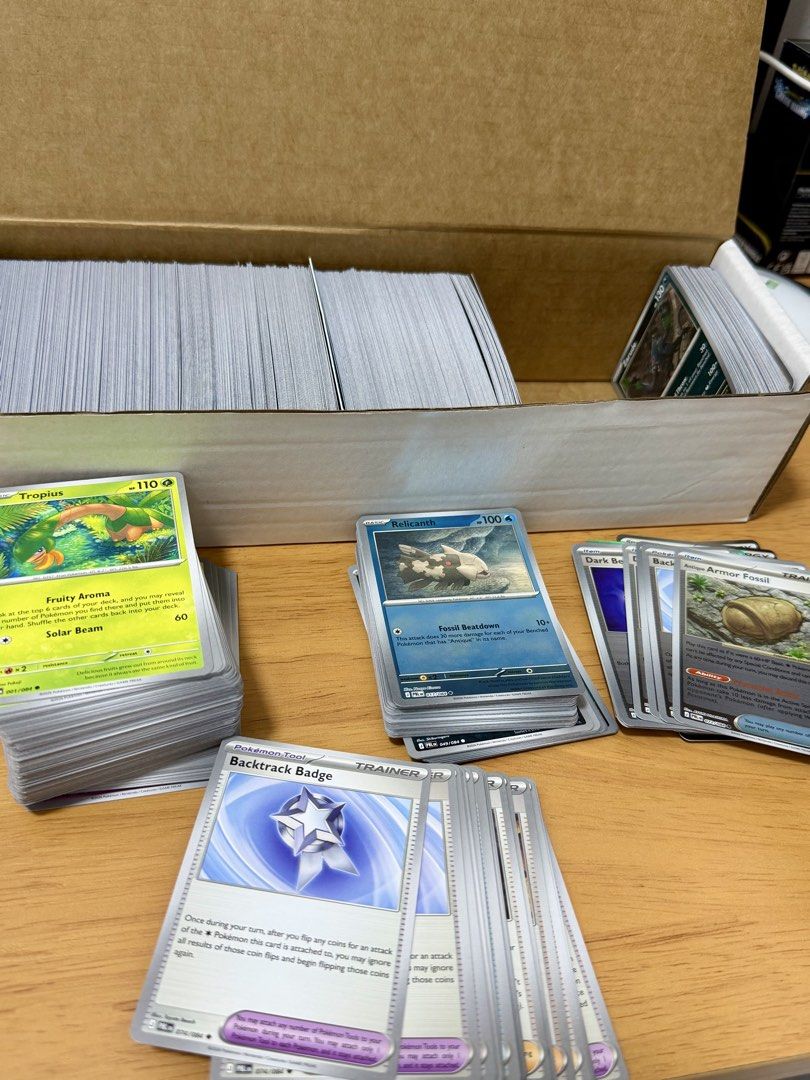 POKEMON TCG: Bulk lot (SFA and PBL) (Category: Card Boxes & Cases) located in Quezon City. Submitted by blueblink35 (Listing ID 1467873348, Image 3). Description: WTS / TAKE ALL: Dual-Set Master Binder Filler Pack (829 Total Cards) Perfect for master set collectors and deck builders! Pre-sorted collection heavily packed with 156 Rev Holos and 73 Holos from Shrouded Fable (SFA) and Pitch Black (PBL) set. All cards are i in mint condition. No Ultra