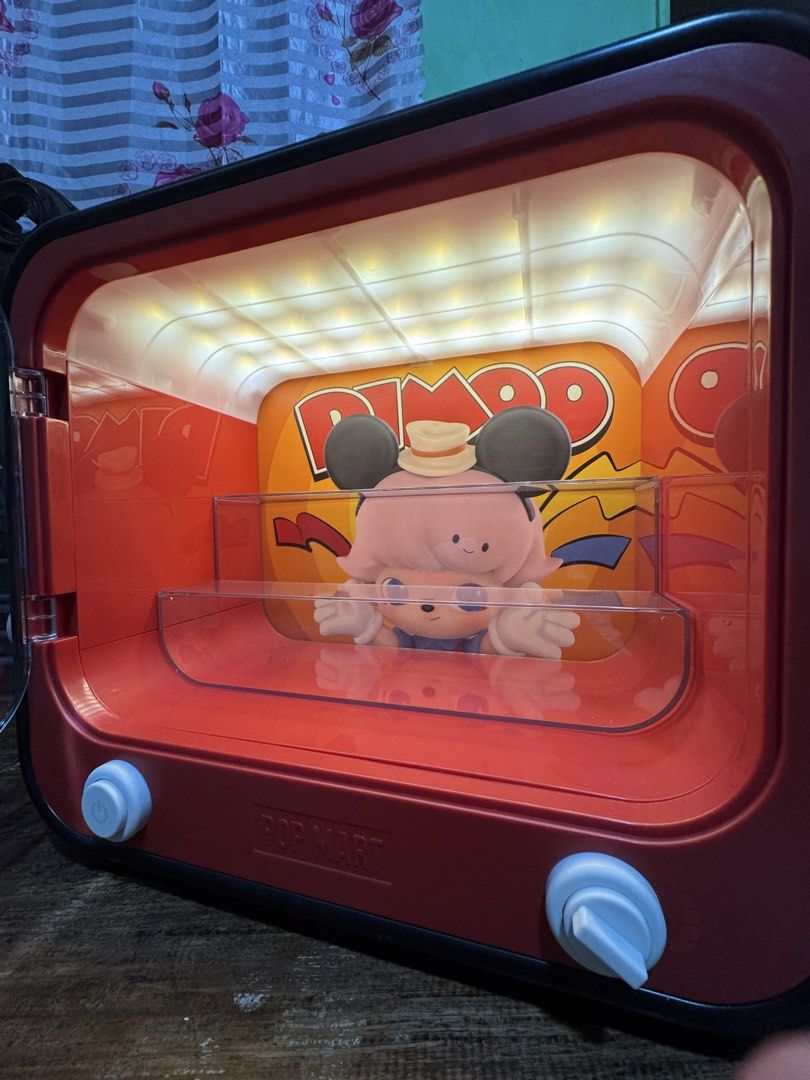 Popmart Dimoo Mickey Mouse Display Case (Category: Designer & Blind Box Toys) located in San Mateo. Submitted by elaravail (Listing ID 1467926279, Image 2). Description: •Display case, cord, and mickey mouse ears only. No original box. •All lights are working. In good condition. No damage or flaws. •Price is negotiable especially when buying my other listings as well. Feel free to make an offer! •MOP: Gcash, Maribank, Gotyme.