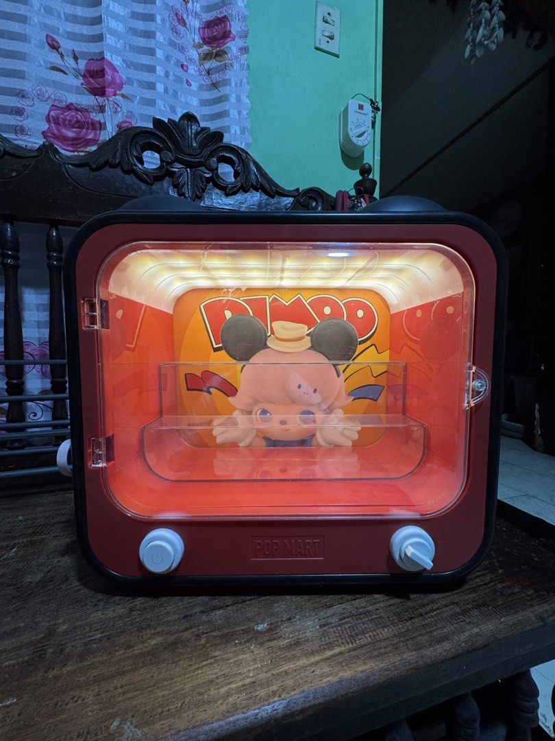 Popmart Dimoo Mickey Mouse Display Case (Category: Designer & Blind Box Toys) located in San Mateo. Submitted by elaravail (Listing ID 1467926279, Image 1). Description: •Display case, cord, and mickey mouse ears only. No original box. •All lights are working. In good condition. No damage or flaws. •Price is negotiable especially when buying my other listings as well. Feel free to make an offer! •MOP: Gcash, Maribank, Gotyme.