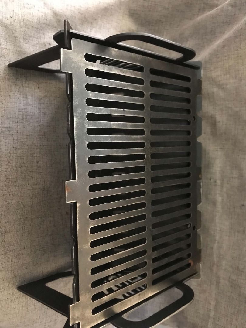 Portable Thick Iron Grill BBQ Camping Stove (Category: BBQ, Grills & Hotpots) located in Quezon City. Submitted by fierceforest_1ab747 (Listing ID 1467842489, Image 1). Description: - Heavy-duty thick iron portable grill, built to handle high heat well - Compact design packs down flat for easy transport and storage - Sturdy interlocking metal plates assemble easily in seconds - Ideal for camping, picnics, beach trips, and backyard barbecues - Wei