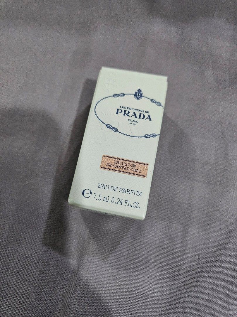 Prada Infusion De Santal Chai Eau De Parfum 7.5ml (Category: Fragrance & Deodorants) located in Makati City. Submitted by cheenaroonie (Listing ID 1467909286, Image 1). Description: - Brand: Prada - Fragrance: Les Infusions de Santal Chai Eau de Parfum - Size: Travel miniature, 7.5ml / 0.24 fl. oz. - Condition: Brand new, unopened in original box - Packaging: Clear glass bottle with silver cap and classic Prada Milano logo - Ideal for trying out 