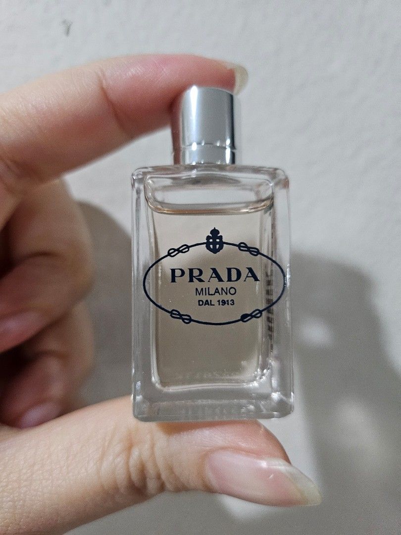 Prada Infusion De Santal Chai Eau De Parfum 7.5ml (Category: Fragrance & Deodorants) located in Makati City. Submitted by cheenaroonie (Listing ID 1467909286, Image 2). Description: - Brand: Prada - Fragrance: Les Infusions de Santal Chai Eau de Parfum - Size: Travel miniature, 7.5ml / 0.24 fl. oz. - Condition: Brand new, unopened in original box - Packaging: Clear glass bottle with silver cap and classic Prada Milano logo - Ideal for trying out 