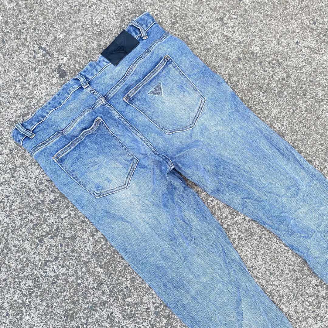 Prade Denim Pants (Category: Jeans) located in Calamba. Submitted by vxd3.store (Listing ID 1467934435, Image 3). Description: Prada Denim Pants Waist 34 Length 40 Leg Open 7 Rise 10.5 Thigh 11 good condition distressed design no issue need wash.