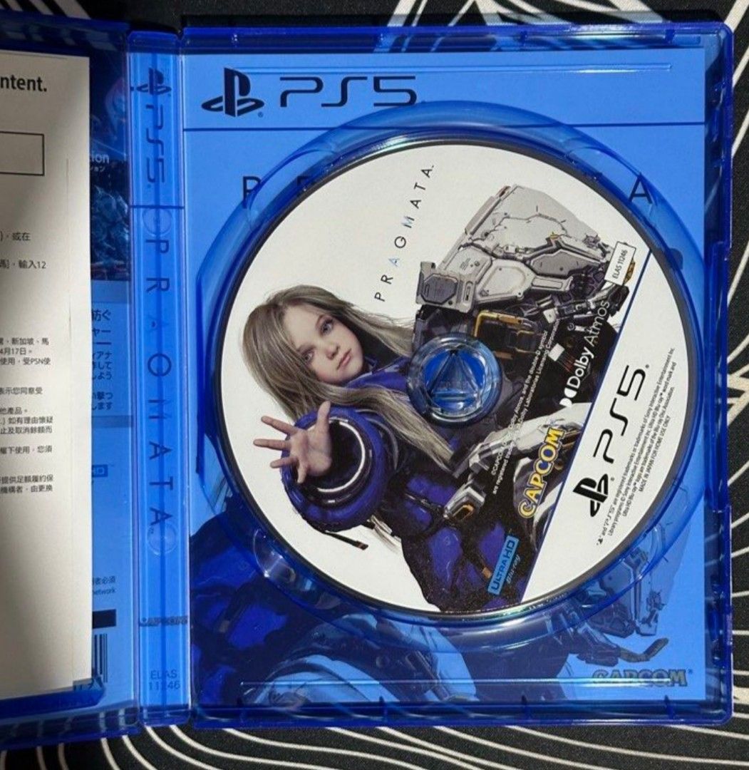 Pragmata PS5 Game Disc with Case (Category: PlayStation) located in Quezon City. Submitted by quickmountain_b45748 (Listing ID 1467988615, Image 2). Description: - Title: Pragmata for PlayStation 5 - Genre: Sci-fi action-adventure (hacking and shooting gameplay) - Condition/Inclusions: Original blue game case, cover art, and game disc in pristine condition - voucher code used already - Region: Japanese and Hong Kong packaging edition - Player Cou