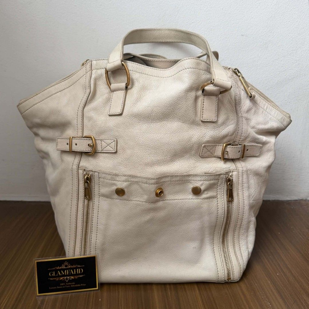 PRE OWNED AUTHENTIC YSL DOWNTOWN BAG (Category: Luxury Bags & Wallets) located in Paranaque City. Submitted by Glamfahd (Listing ID 1467912962, Image 1). Description: Pre Owned Authentic YSL Bag Inclusion/s: None Condition Well Used condition Marks on exterior Marks on interior Bag is really a great buy! Please manage your expectations as you are buying an authentic second hand item at a fraction of the cost.