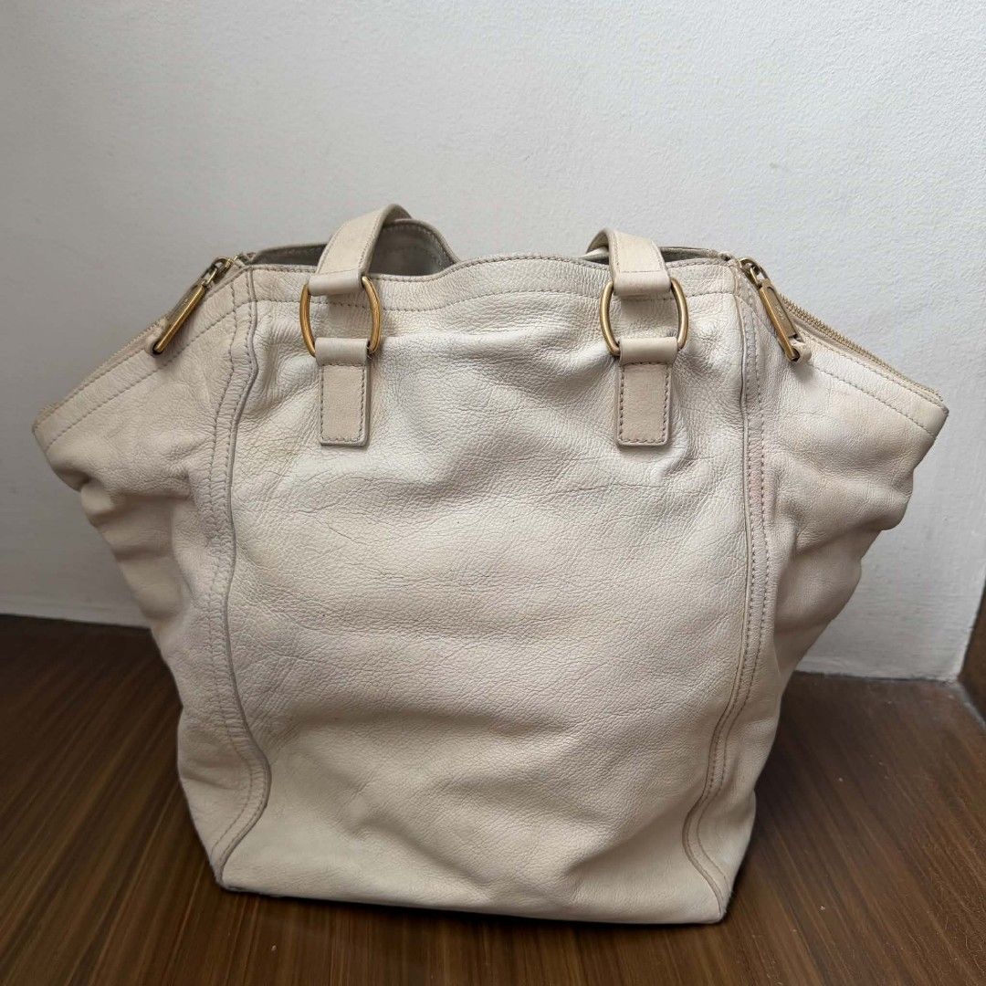 PRE OWNED AUTHENTIC YSL DOWNTOWN BAG (Category: Luxury Bags & Wallets) located in Paranaque City. Submitted by Glamfahd (Listing ID 1467912962, Image 3). Description: Pre Owned Authentic YSL Bag Inclusion/s: None Condition Well Used condition Marks on exterior Marks on interior Bag is really a great buy! Please manage your expectations as you are buying an authentic second hand item at a fraction of the cost.