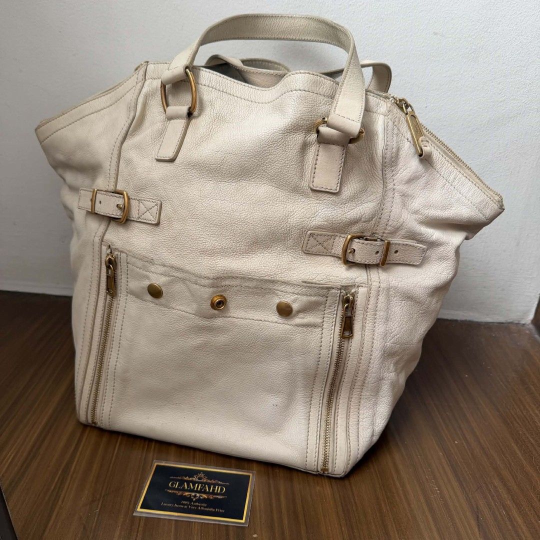 PRE OWNED AUTHENTIC YSL DOWNTOWN BAG (Category: Luxury Bags & Wallets) located in Paranaque City. Submitted by Glamfahd (Listing ID 1467912962, Image 2). Description: Pre Owned Authentic YSL Bag Inclusion/s: None Condition Well Used condition Marks on exterior Marks on interior Bag is really a great buy! Please manage your expectations as you are buying an authentic second hand item at a fraction of the cost.