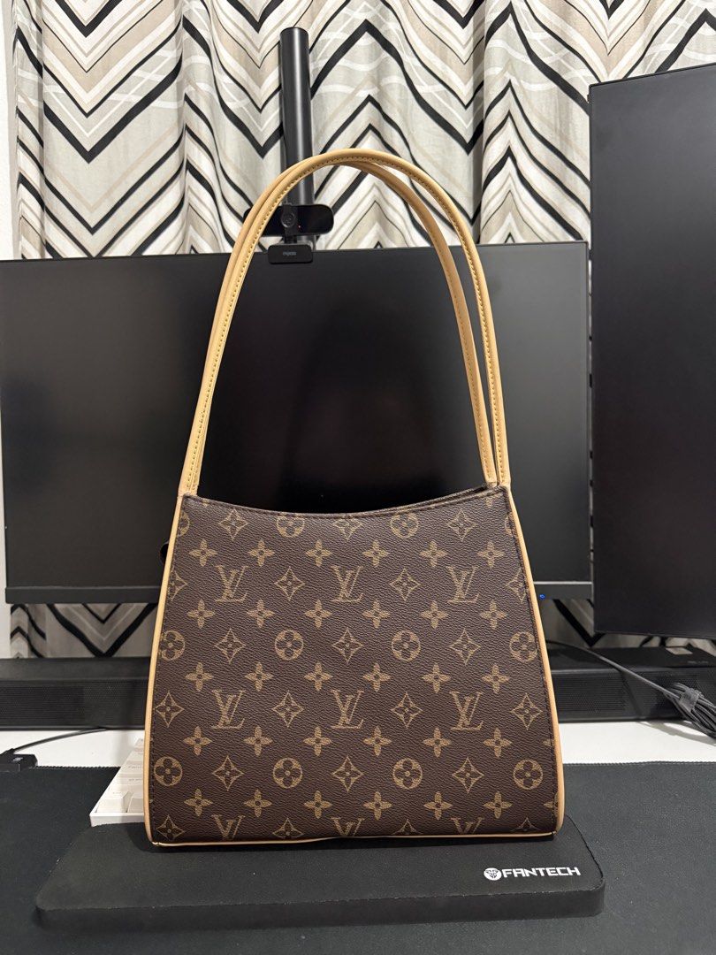 Preloved LV with free wallet (Category: Shoulder Bags) located in Quezon City. Submitted by annefaulan (Listing ID 1468048982, Image 2). Description: Selling my preloved LV bag & giving the wallet for free. No issue. Can ship via Lalamove or J&T. PM if interested ‼️.
