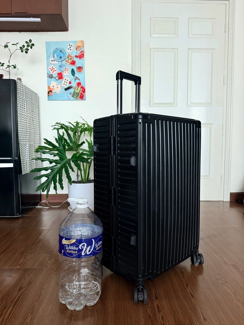 Premium Compass Zipperless XL luggage (Category: Luggage) located in Manila. Submitted by thatgirl0001 (Listing ID 1468053833, Image 1). Description: This luggage was used twice only to film content. Original price: ₱ 14,999 Construction: Hard-shell, zipperless Closure: Aluminum/metal side latches Security: Anti-theft aluminum locking system Wheels: 4-wheel spinner system + wheel protection Handle: Telescoping dual-bar trolley handle Shell: Ribbe
