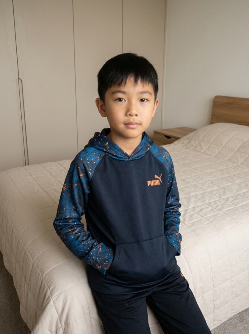 Puma Hoodie for Kids (Category: Babies & Kids Fashion) located in Cavite. Submitted by naning049 (Listing ID 1421131999, Image 1). Description: - Navy blue Puma hoodie - Patterned hood and sleeves - Orange Puma logo - Front pocket - 100% polyester - Made in Egypt - RN 143678, CA 57299 -size 12m (US) fixed price -chest- 36" -length drop-21" NO FLAWS.