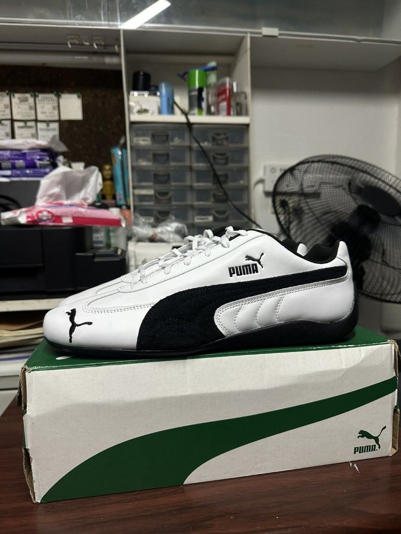 Puma White and Black Sneakers in Box (Category: Casual Shoes) located in Quezon City. Submitted by tikboydabigboy.tikboydabigboy (Listing ID 1467879391, Image 1). Description: Puma Speedcat White with Black Logo .