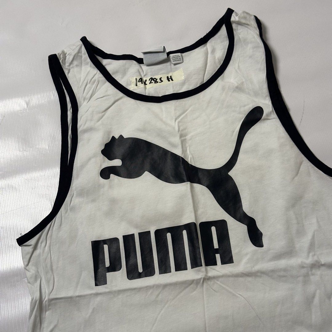 Puma White Black Tank Top Size S (Category: Tshirts & Polo Shirts ) located in Gapan. Submitted by rasthriftshop17 (Listing ID 1467998621, Image 2). Description: Size on tag: S Dimes: 19 x 28 Condition: Excellent Color rate: 9/10 Issue: None.
