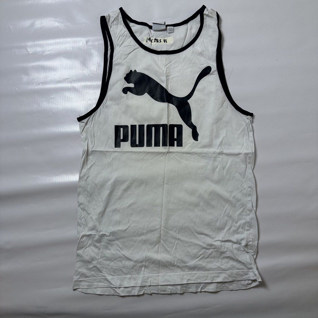 Puma White Black Tank Top Size S (Category: Tshirts & Polo Shirts ) located in Gapan. Submitted by rasthriftshop17 (Listing ID 1467998621, Image 1). Description: Size on tag: S Dimes: 19 x 28 Condition: Excellent Color rate: 9/10 Issue: None.