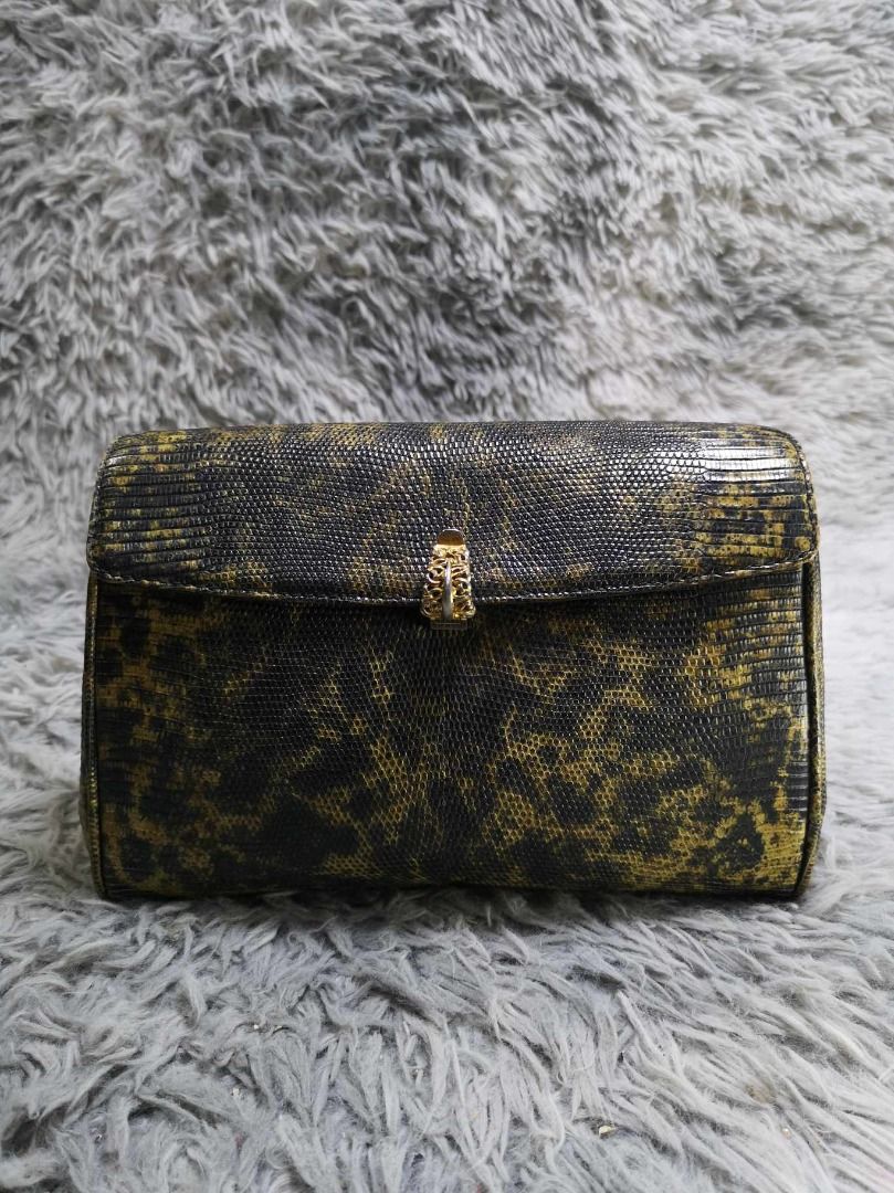 Python Print Flap Clutch Bag (Category: Clutches) located in Santa Cruz. Submitted by jmy_surplus.2 (Listing ID 1467914539, Image 1). Description: Size ; L- 8 W - 10.2 Color ; Black , Gold Type ; Clutch Brand ; No brand Material ; Leather Style ; Gold Tone Closure Clutch Bag LG 117 JMY 3 Batch #225.