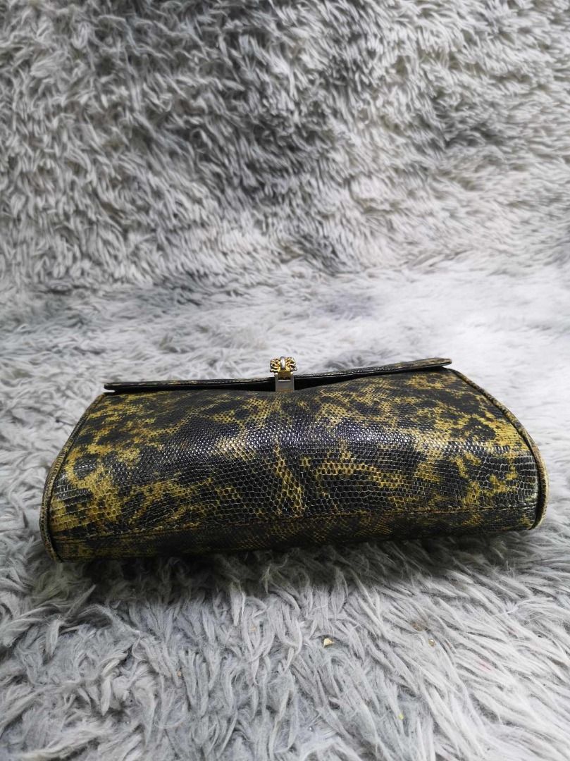 Python Print Flap Clutch Bag (Category: Clutches) located in Santa Cruz. Submitted by jmy_surplus.2 (Listing ID 1467914539, Image 2). Description: Size ; L- 8 W - 10.2 Color ; Black , Gold Type ; Clutch Brand ; No brand Material ; Leather Style ; Gold Tone Closure Clutch Bag LG 117 JMY 3 Batch #225.