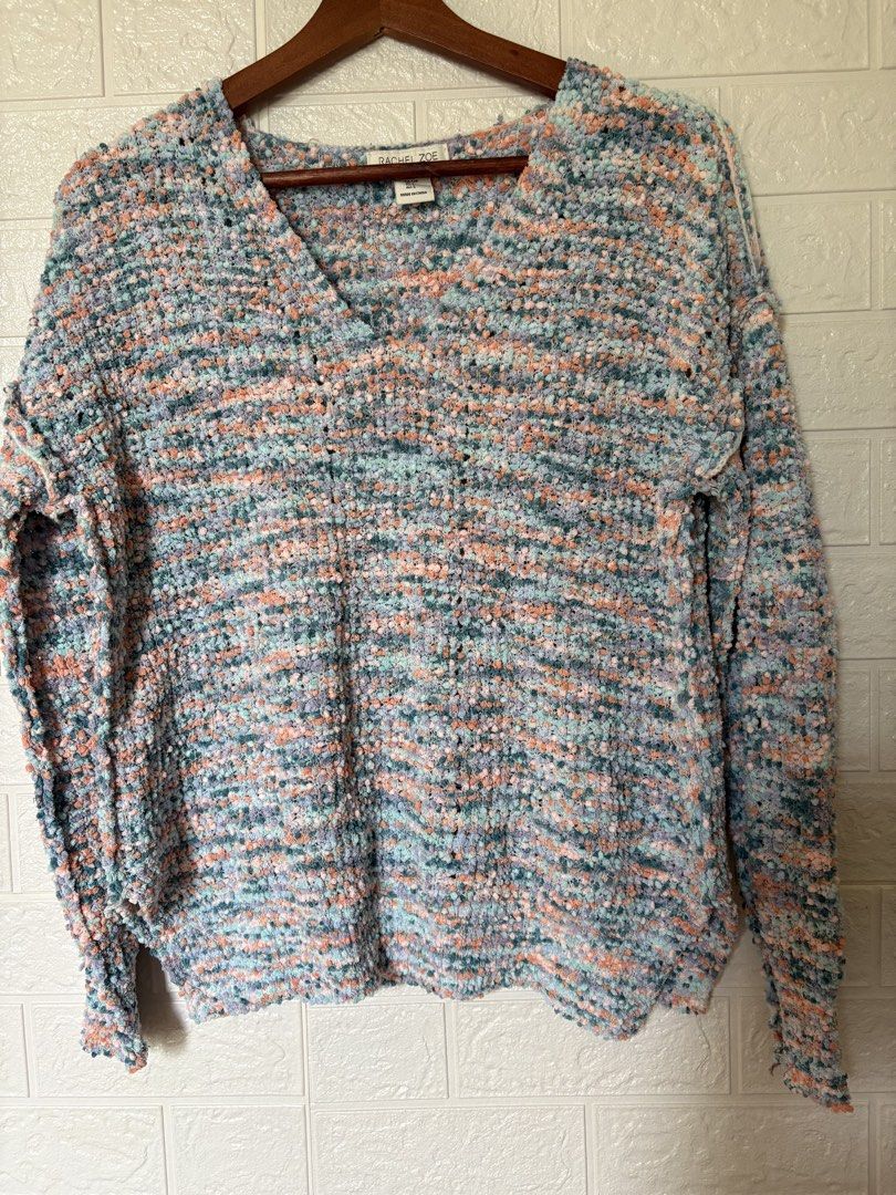 Rachel Zoe V-Neck Sweater (Category: Longsleeves) located in Batangas. Submitted by purple_and_orange (Listing ID 1467862708, Image 1). Description: - Brand: Rachel Zoe - Size: S (US/CA/UK/EU/AU compliant) - Material: Multi-colored textured knit - Colors: Pastel pink, blue, and orange tones - Design: V-neckline, long sleeves, relaxed fit .