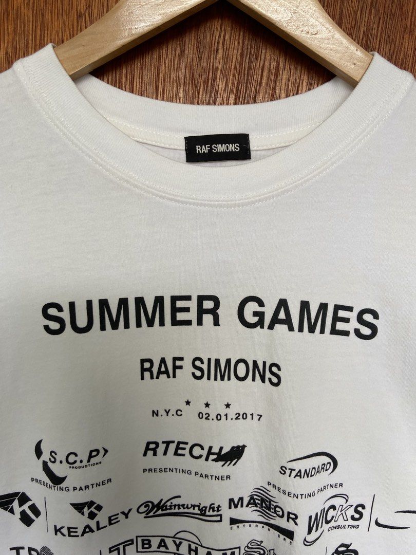 Raf Simon Summer Games Tee (Category: Tshirts & Polo Shirts ) located in Panabo. Submitted by thrifty.red (Listing ID 1467887274, Image 2). Description: width:22 length:28 need wash washable yellow.
