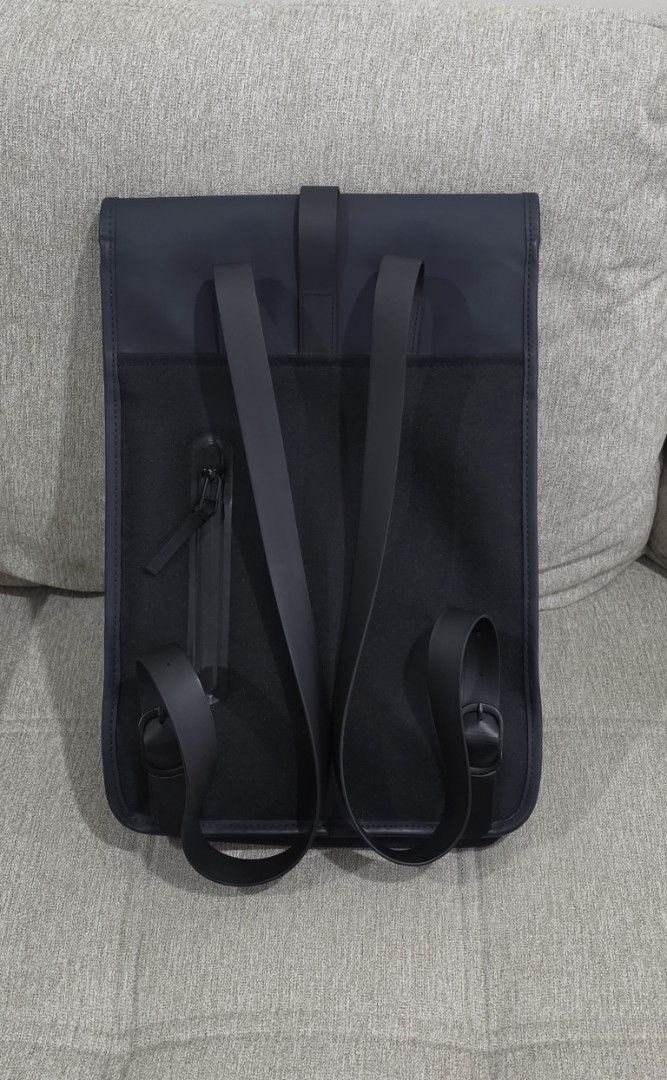 Rains Backpack (Category: Backpacks) located in Quezon City. Submitted by jjamestan (Listing ID 1467889100, Image 2). Description: Selling my RAINS backpack in navy blue / dark blue. Features: • Water-resistant material • Minimalist Scandinavian design • Signature front flap with carabiner closure • Adjustable shoulder straps • Spacious main compartment • Interior zip pocket Perfect for everyday use, work, commuting, and travel. Sleek, functional