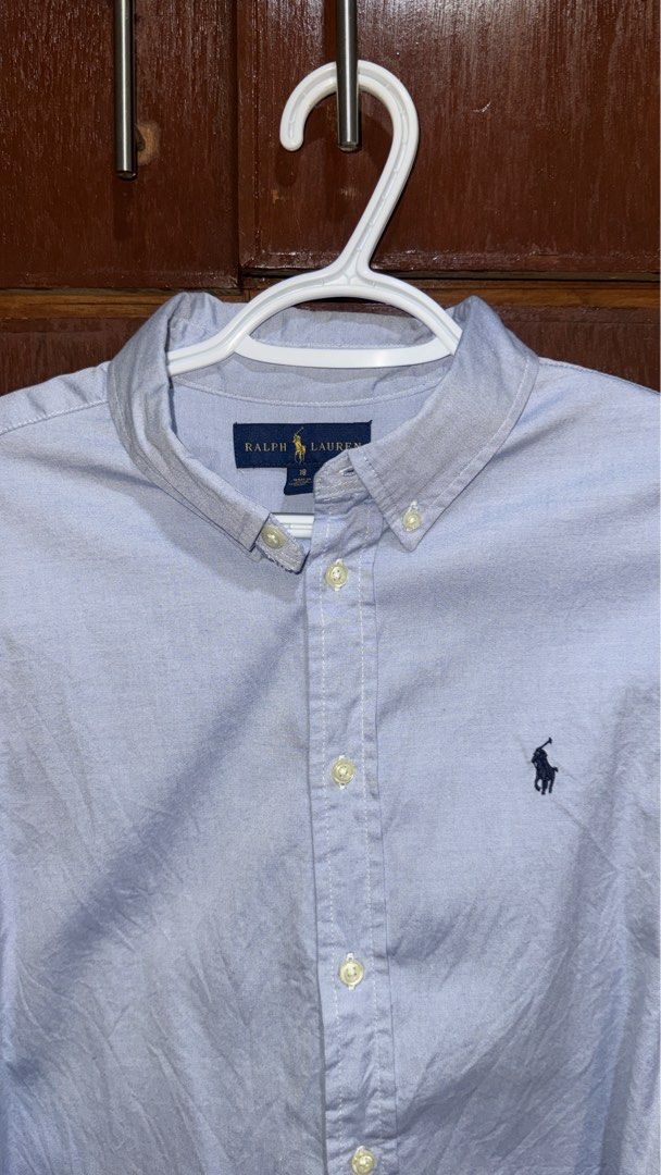 Ralph Lauren Light Blue Long Sleeve Size 18 (Category: Tshirts & Polo Shirts ) located in General Trias. Submitted by jameswlopez (Listing ID 1467975739, Image 2). Description: Selling my Ralph Lauren Light Blue Oxford Button-Down Shirt -Color: Light Blue -Style: Classic Oxford Long Sleeve Button-Down Shirt -Size: 18 -Condition: Great condition 📦 Shipping: Available via J&T or LBC. Shipping fee to be shouldered by the buyer..