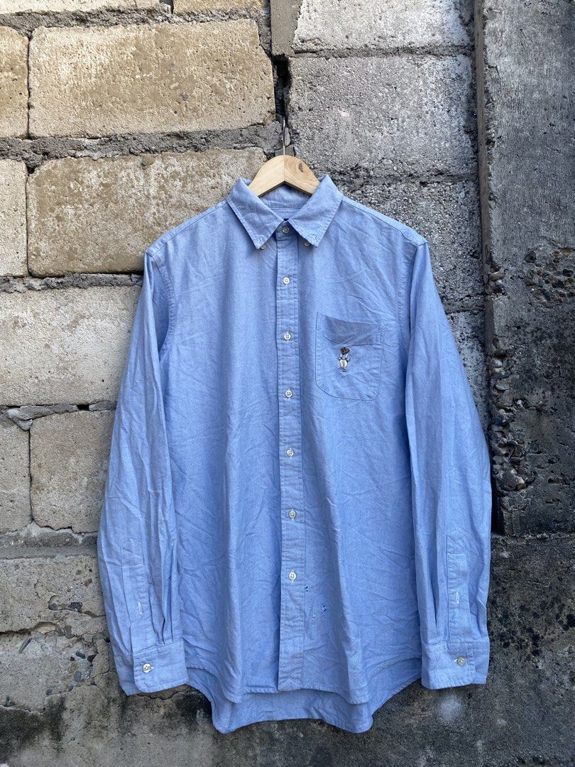 Ralph Lauren Polo Bear Button Down (Category: Activewear) located in Candaba. Submitted by dejesus.bench17 (Listing ID 1468008092, Image 1). Description: Polo Ralph Lauren Polo Bear Button Down -Color: Sky blue -Condition: Excellent -Color rate: 9/10 -Issue: See last pic -Dimes: W22 L29 -Price: 999 + ship.