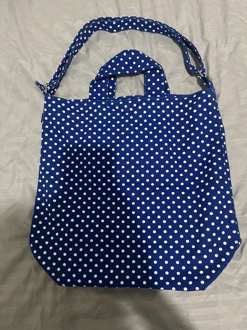[DEADSTOCK] BAGGU Duck Bag - Blue Polka Dot (Category: Cross-body Bags) located in Mabalacat. Submitted by keb-a (Listing ID 1467889072, Image 3). Description: 🍒 — Measures 15.75" H × 11" W × 4.75" L — Interior patch pocket — 40" adjustable strap strap with top carry handles — 20" max strap drop — 16 oz recycled cotton canvas 🍒 — 100% authentic — Versatile 3-way bag: wear it cross-body, over the shoulder, or carry it by the top handles — Discon