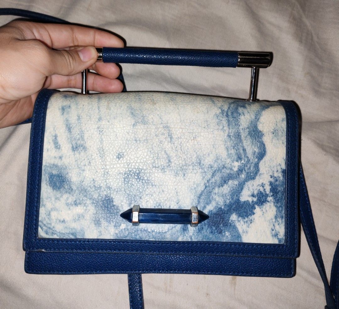 Rare Charles And Keith Marble Design Bag (Category: Cross-body Bags) located in Cagdianao. Submitted by lavendear.clotheshoppe (Listing ID 1467863628, Image 1). Description: Super unique, marble design Charles And Keith Crossbody bag Very eye catching, collector's piece! We ship nationwide via tiktok Check out.