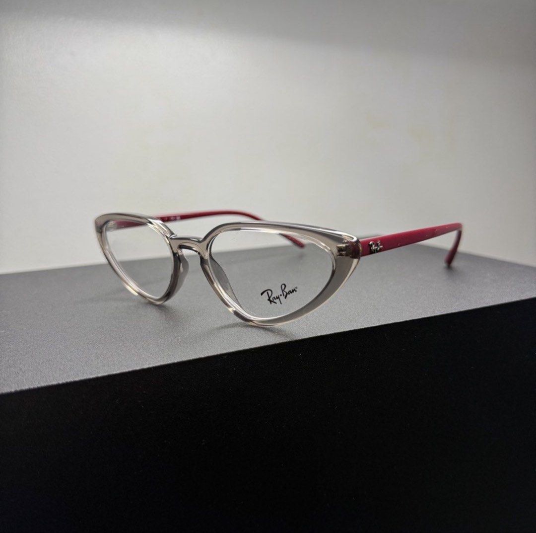 Ray-Ban Cat Eye Eyeglasses Clear and Red (Category: Sunglasses & Eyewear) located in Marikina City. Submitted by bbbiancsss (Listing ID 1467995252, Image 1). Description: Brand New Authentic Ray-Ban Eyeglasses Includes: - Original case and cleaning cloth - Voucher for Free Lens and Eye Exam valid until Dec. 31, 2026 Frame Shape: Cat Eye Frame Color: Transparent Grey Lens Color: Clear Frame Type: Full Rim Material: Plastic .