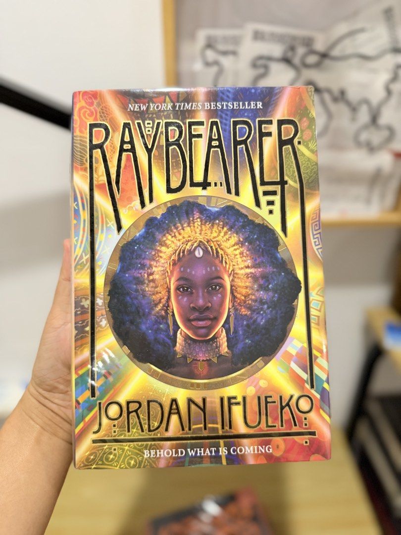 Raybearer by Jordan Ifueko (Category: Storybooks) located in Toledo. Submitted by alziaron (Listing ID 1467955643, Image 1). Description: 📚 Title: Raybearer by Jordan Ifueko Format: Hardcover Condition: See attached photos. Wrapped in protective plastic covering Accolade: New York Times bestseller award-winning story Mode of Payment 💰 Payment first through maribank/gotyme Mode of Delivery 🚚 Buyer will shoulder the shipping fee via J&T.