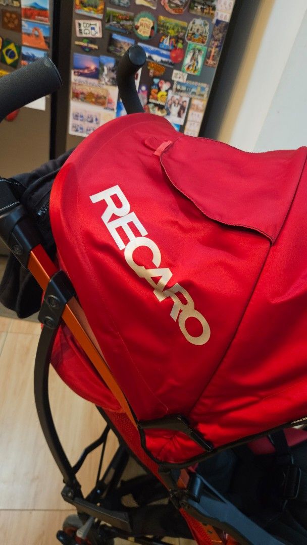 Recaro Red Stroller (Category: Strollers) located in Alfonso. Submitted by jbcamet (Listing ID 1467999206, Image 2). Description: - Authentic Recaro stroller in a bold red and black colorway - Adjustable recline mechanism with a convenient rear pull cord - Large canopy featuring the signature Recaro branding - Built-in mesh sides for optimal airflow and breathability - Padded harness straps with comfortable branded shoulder pads - Multi-wheel set