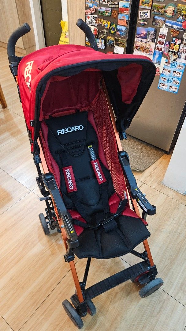 Recaro Red Stroller (Category: Strollers) located in Alfonso. Submitted by jbcamet (Listing ID 1467999206, Image 1). Description: - Authentic Recaro stroller in a bold red and black colorway - Adjustable recline mechanism with a convenient rear pull cord - Large canopy featuring the signature Recaro branding - Built-in mesh sides for optimal airflow and breathability - Padded harness straps with comfortable branded shoulder pads - Multi-wheel set
