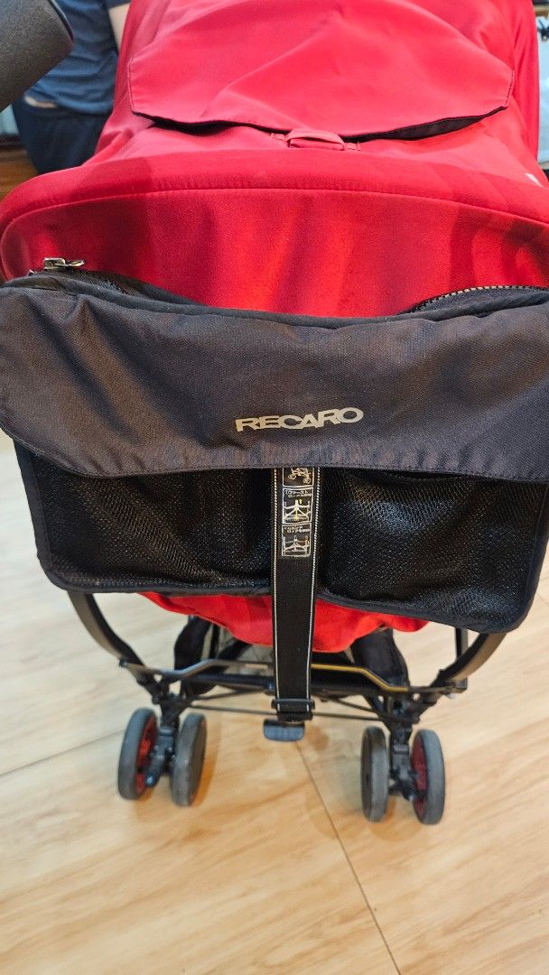 Recaro Red Stroller (Category: Strollers) located in Alfonso. Submitted by jbcamet (Listing ID 1467999206, Image 3). Description: - Authentic Recaro stroller in a bold red and black colorway - Adjustable recline mechanism with a convenient rear pull cord - Large canopy featuring the signature Recaro branding - Built-in mesh sides for optimal airflow and breathability - Padded harness straps with comfortable branded shoulder pads - Multi-wheel set