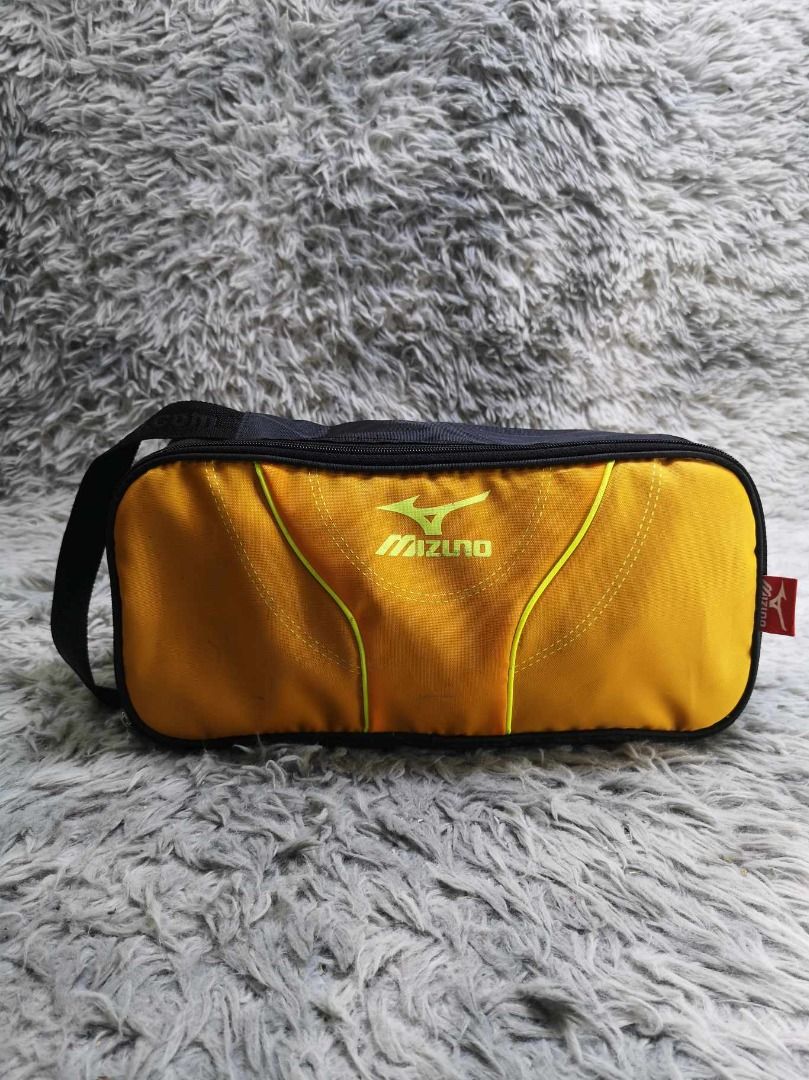 Rectangular Zippered Utility Pouch With Carrying Handle (Category: Belt bags, Clutches and Pouches) located in Santa Cruz. Submitted by jmy_surplus.2 (Listing ID 1467915670, Image 1). Description: Size ; L - 13.4 W - 10.1 Color ; Orange Type ; Utility Pouch Brand ; No brand Material ; Nylon Style ; Orange Black Utility Pouch LG 117 JMY 3 Batch #225.