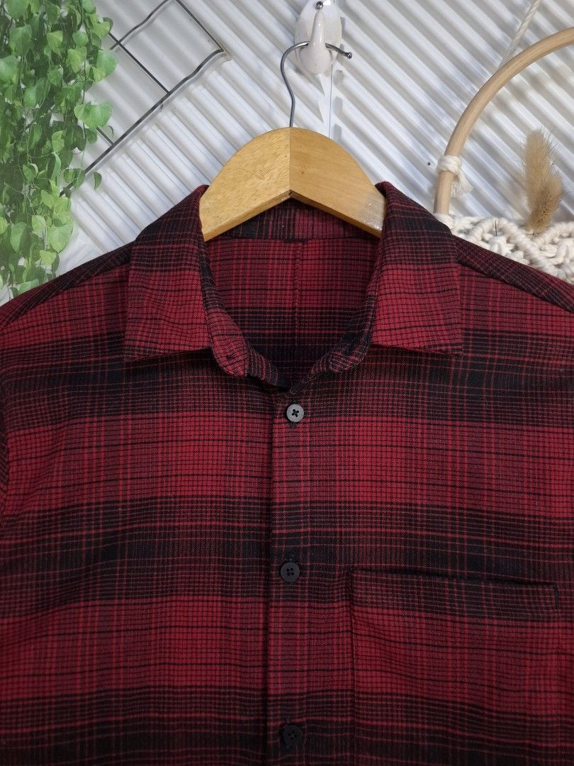 Red and Black Plaid Button-Down Shirt Size S-M (Category: Formal Shirts) located in Bulacan. Submitted by cathycampo51092 (Listing ID 1467842232, Image 2). Description: Red and black plaid flannel shirt with a chest pocket and black buttons. Fits sizes small to medium. Chest measures 20 inches across and length is 27 inches. Condition is listed as 10/10 in the photos..