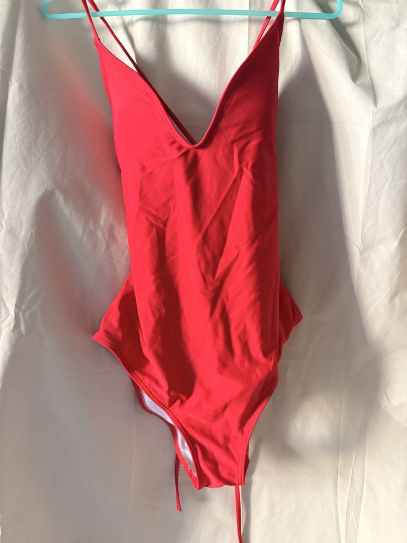 Red padded backless self tie back Swimsuit (Category: Bikinis & Swimsuits) located in Quezon City. Submitted by kaye1001 (Listing ID 1467988859, Image 2). Description: Small but can fit to medium - stretchable WORN ONCE ONLY RFS- decluttering NO TO SCAMMERS/FAKE BUYERS PLS. Delivery- Lalamove/move it/maxim Payment- gcash/maribank/gotyme/maya.