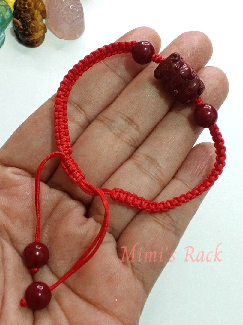 Red Rope Bracelet with Cinnabar Ox Charm (Category: Bracelets) located in Taguig. Submitted by mimisrack (Listing ID 1467972254, Image 3). Description: ❤️A traditional-inspired red braided rope bracelet featuring a carved red ox-style charm and matching round beads. The vibrant red cord gives it a classic Chinese lucky charm aesthetic, while the detailed animal carving adds a meaningful touch. ❤️ Ox Symbolism & Traditional Beliefs - 💪 Strength &