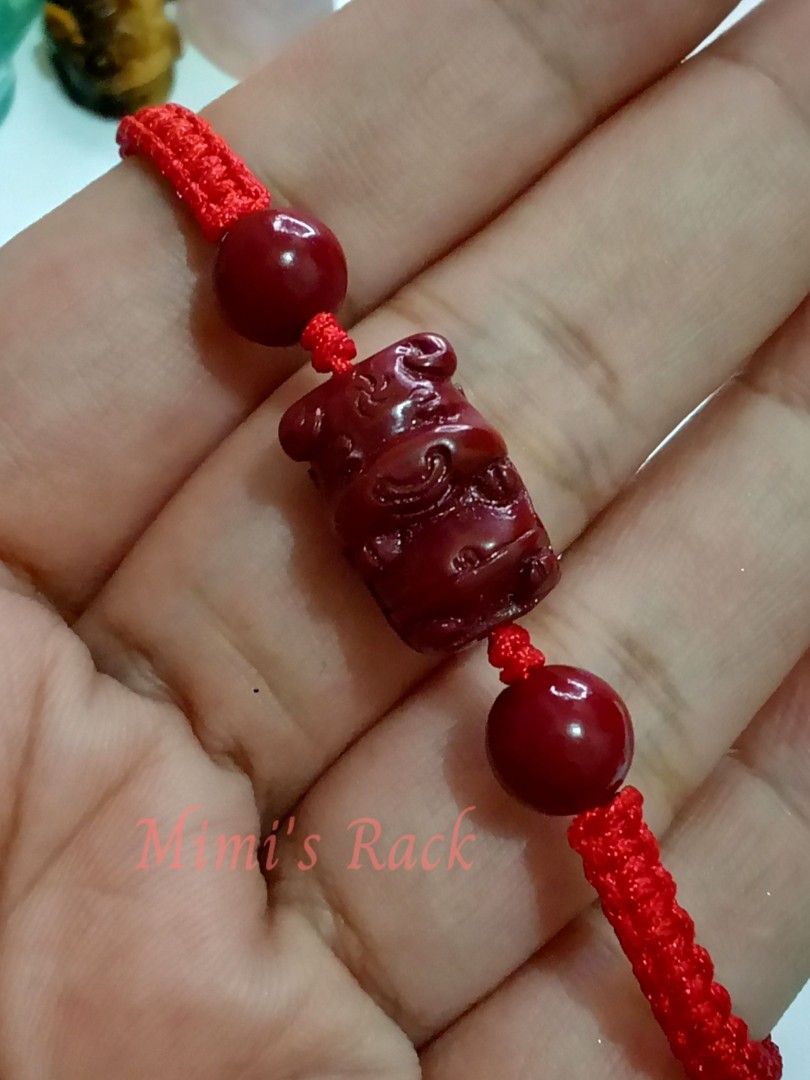 Red Rope Bracelet with Cinnabar Ox Charm (Category: Bracelets) located in Taguig. Submitted by mimisrack (Listing ID 1467972254, Image 2). Description: ❤️A traditional-inspired red braided rope bracelet featuring a carved red ox-style charm and matching round beads. The vibrant red cord gives it a classic Chinese lucky charm aesthetic, while the detailed animal carving adds a meaningful touch. ❤️ Ox Symbolism & Traditional Beliefs - 💪 Strength &