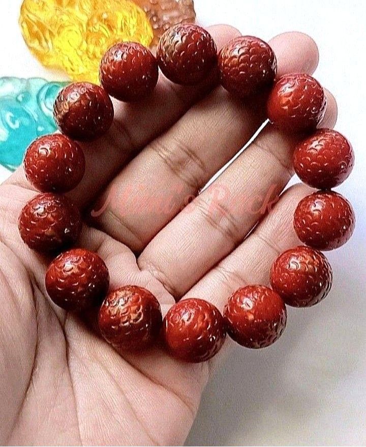 RED SEA WILLOW DRAGON SCALE DESIGN BRACELET (Category: Bracelets) located in Taguig. Submitted by mimisrack (Listing ID 1467844426, Image 3). Description: ❤️Bold warrior-inspired bracelet symbolizing strength and rising power -Red Sea Willow represents vitality, courage, and grounded resilience -Dragon scale design symbolizes protection, strength, and authority -Red tones evoke confidence, ambition, and powerful life force energy -Traditionally a