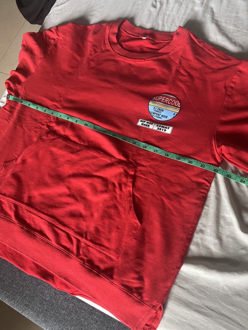 Red Super Cool Graphic Sweatshirt With Front Pocket (Category: Coats, Jackets and Outerwear) located in Manila. Submitted by whosvelvet (Listing ID 1467905661, Image 3). Description: - Color: Red - Design: Eye-catching graphic prints on chest, sleeves, and back - Fit: 22” W, 24.5” L - Features: Front pouch pocket and ribbed cuffs - Material: Comfortable, breathable cotton fabric - SF care of buyer - Payment: Gcash or Maya (NO COD!).